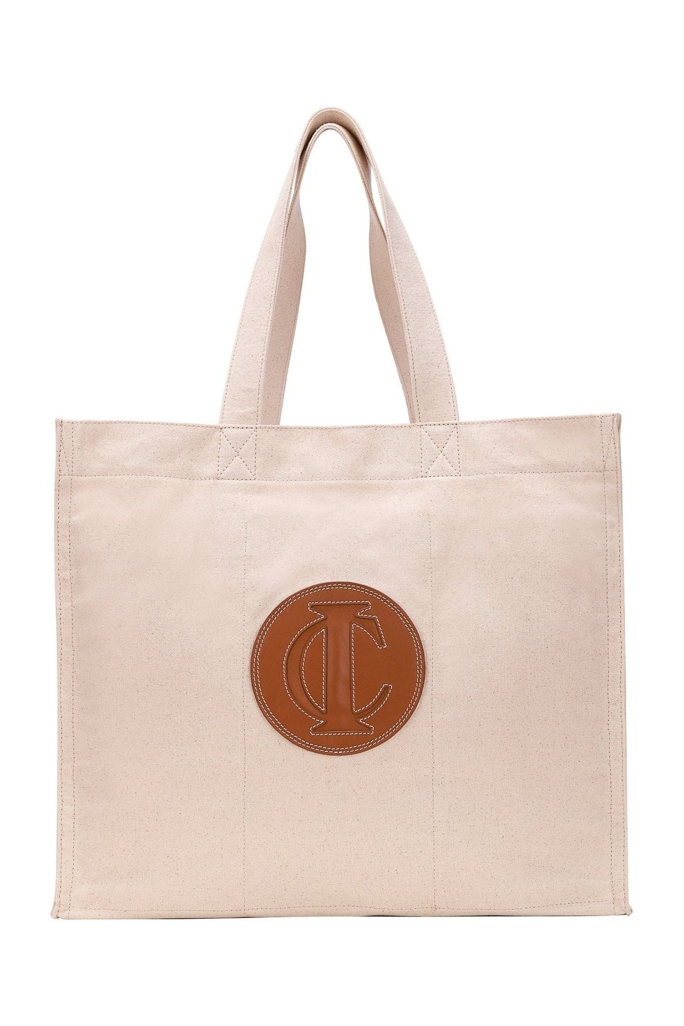 Natural canvas farmers market tote with leather emblem