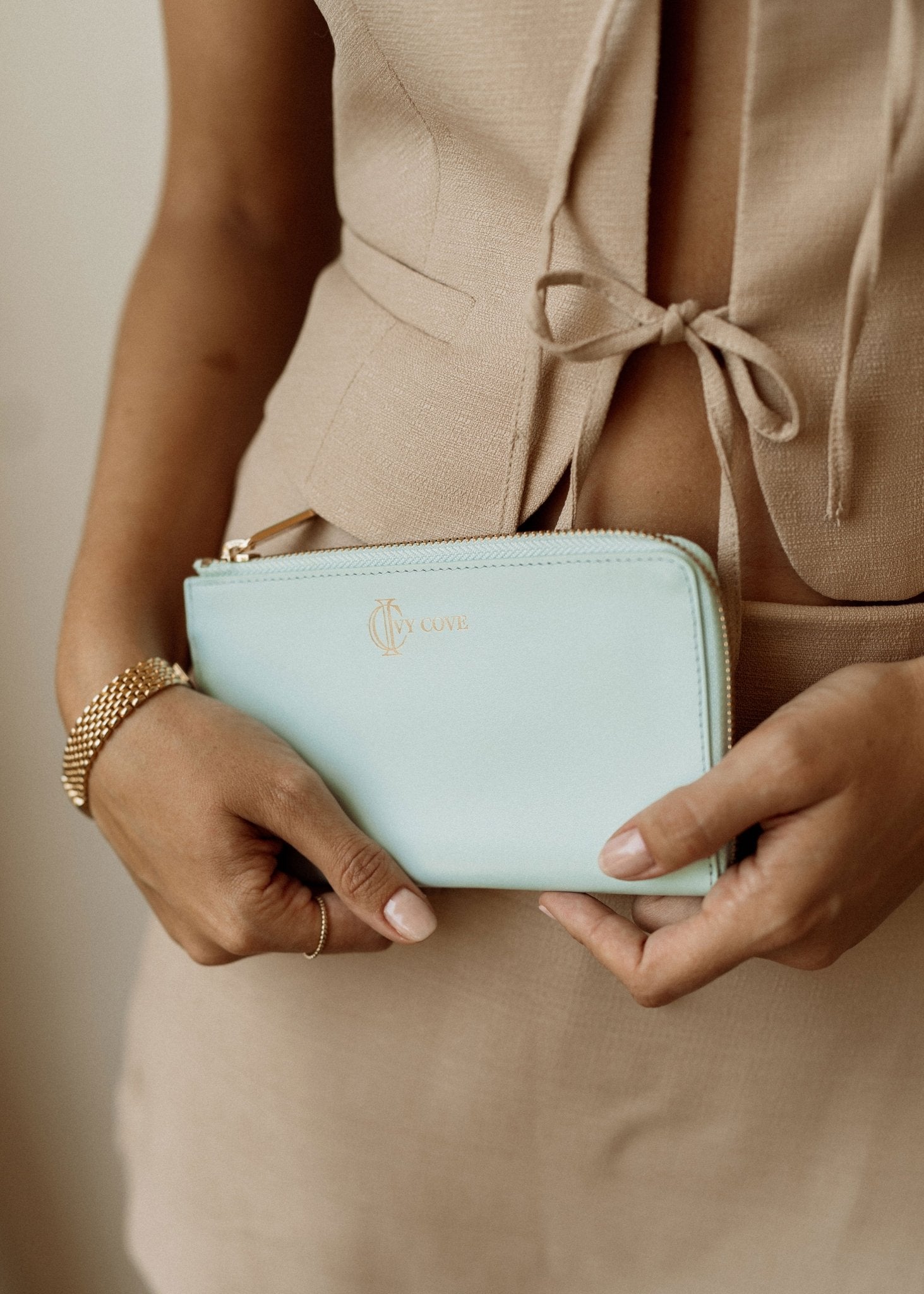 Woman with premium leather wallet clutch