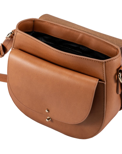 Equestrian crossbody bag with the flap open, showing the lined main compartment