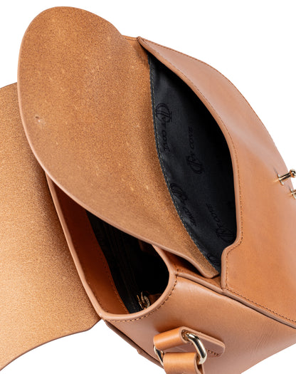 Close-up of the Equestrian crossbody flap and the Ivy Cove label inside