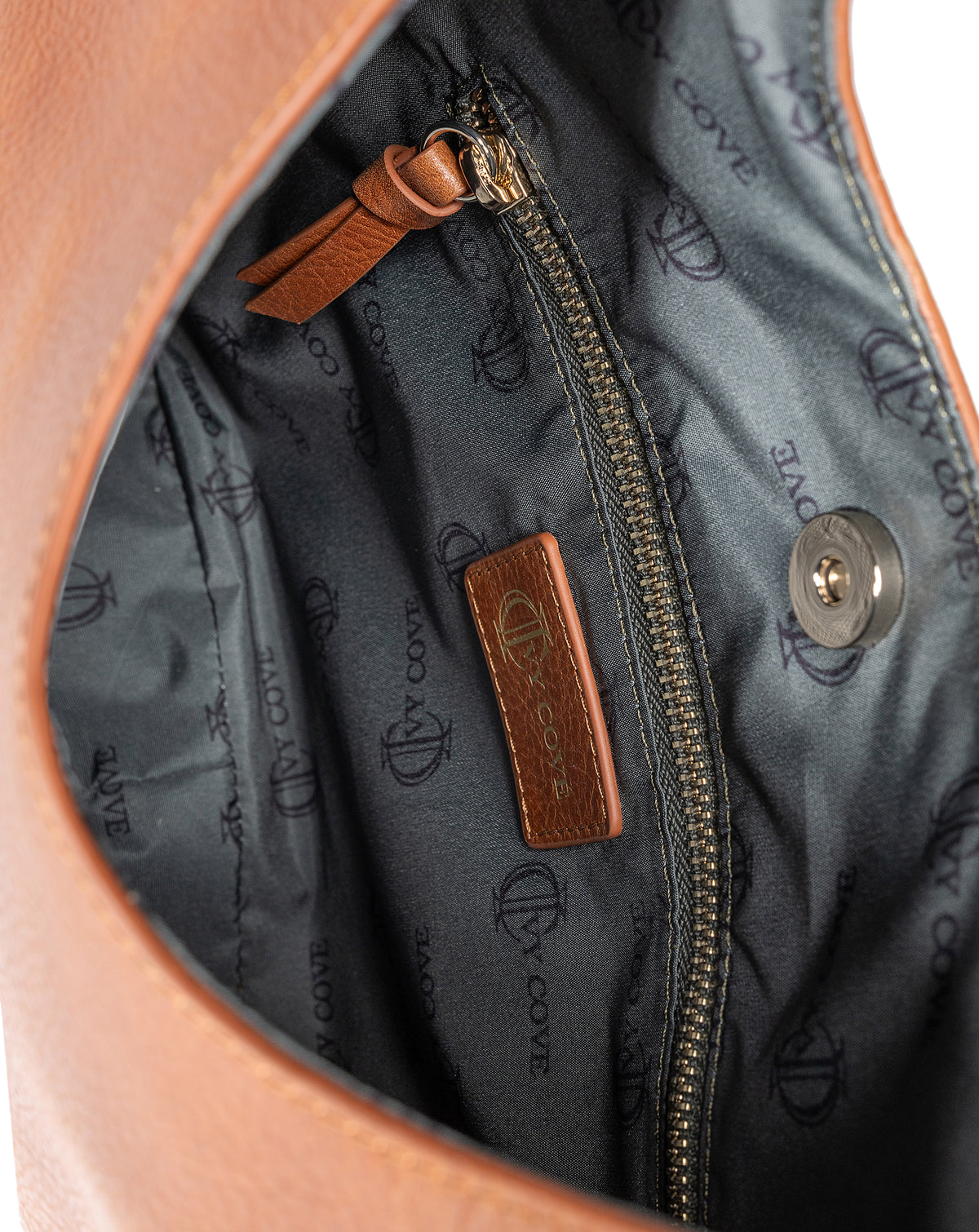 Close-up of smooth leather texture  and interior detail on hobo bag