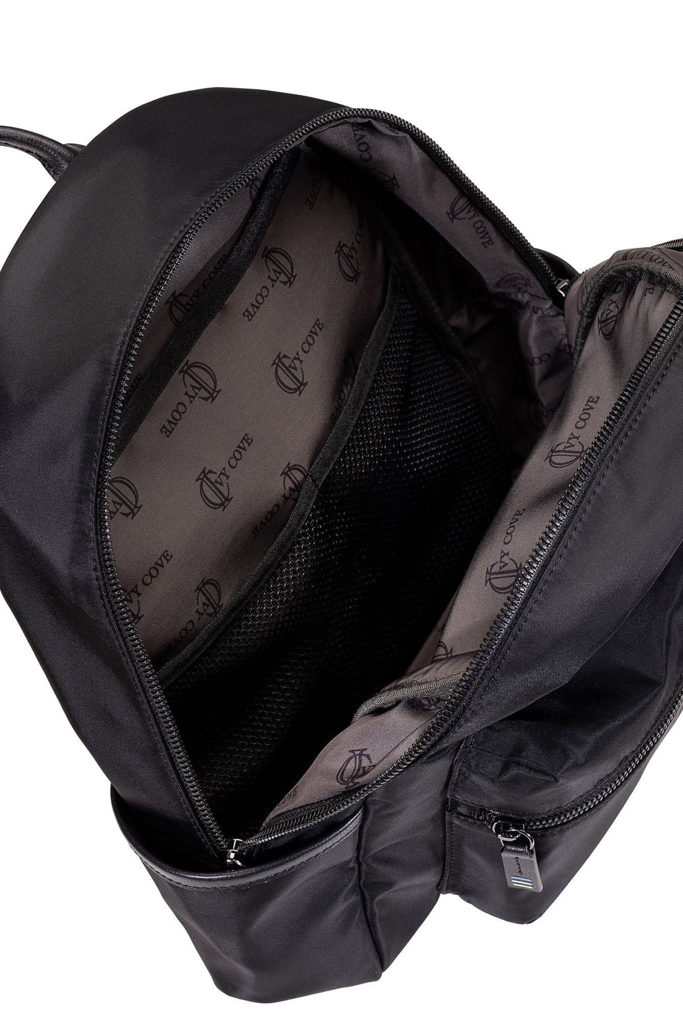 Close-up of tonal metal zipper and Ivy Cove logo on recycled black nylon fabric.