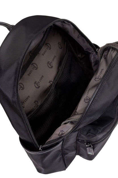 Close-up of tonal metal zipper and Ivy Cove logo on recycled black nylon fabric.