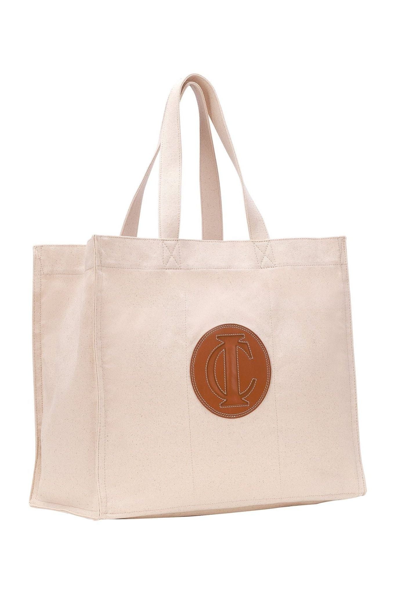 Side detail of natural canvas market tote